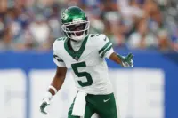 Garrett Wilson, New York Jets wide receiver, preparing to run a route.